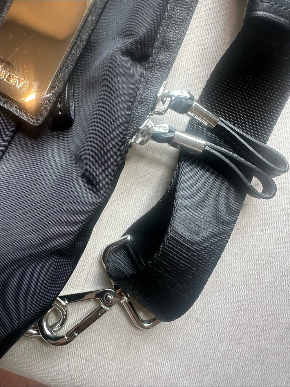 Tumi compact sling
